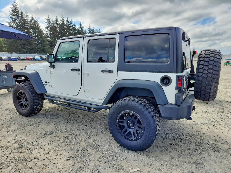2014 Jeep VIN 1C4BJWDG5EL145797 COPART salvage auction — SIDE, Wa - Vehicle Cert Of Ownership-Titl, sold $7,100 on 2026-07-11 (photo 2)