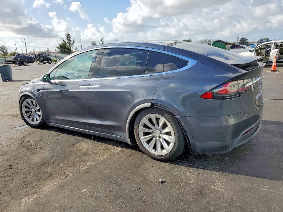 2017 Tesla Model x VIN 5YJXCDE29HF052215 COPART salvage auction — FRONT END, Fl - Certificate Of Title (P), sold $9,300 on 2026-07-21 (photo 2)