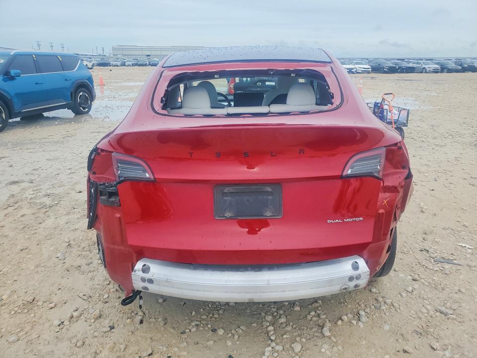 2023 Tesla Model y VIN 7SAYGDEE9PA099620 COPART salvage auction — REAR END, Tx - Salvage Vehicle Title, sold $6,400 on 2026-07-16 (photo 6)