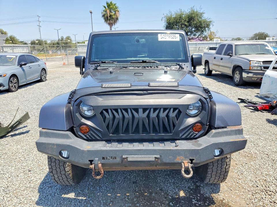 2018 Jeep Wrangler unlimited VIN 1C4BJWDG5JL851534 COPART salvage auction — MINOR DENT/SCRATCHES, Hi - Dis/Dlr/Exp Only Clean Title, sold $14,900 on 2026-07-10 (photo 5)