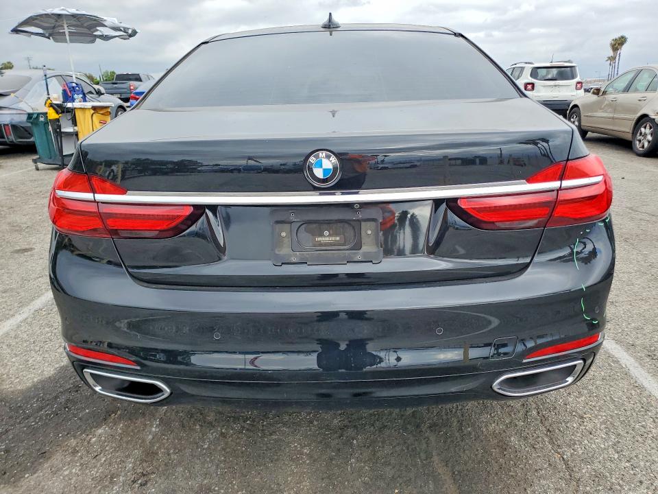 2016 BMW 7er VIN WBA7E2C52GG738741 COPART salvage auction — SIDE, Salvage Title, sold $8,100 on 2026-08-04 (photo 6)