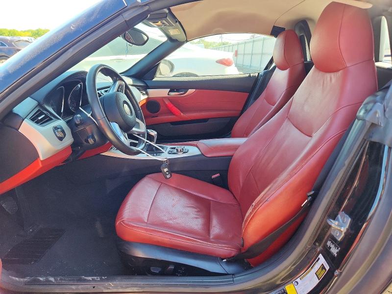 2011 BMW Z4 VIN WBALM5C59BE495940 COPART salvage auction — MINOR DENT/SCRATCHES, Fl - Cert Of Ttl-Rebuilt&Slvg Rbld (P), sold $2,700 on 2026-07-08 (photo 7)