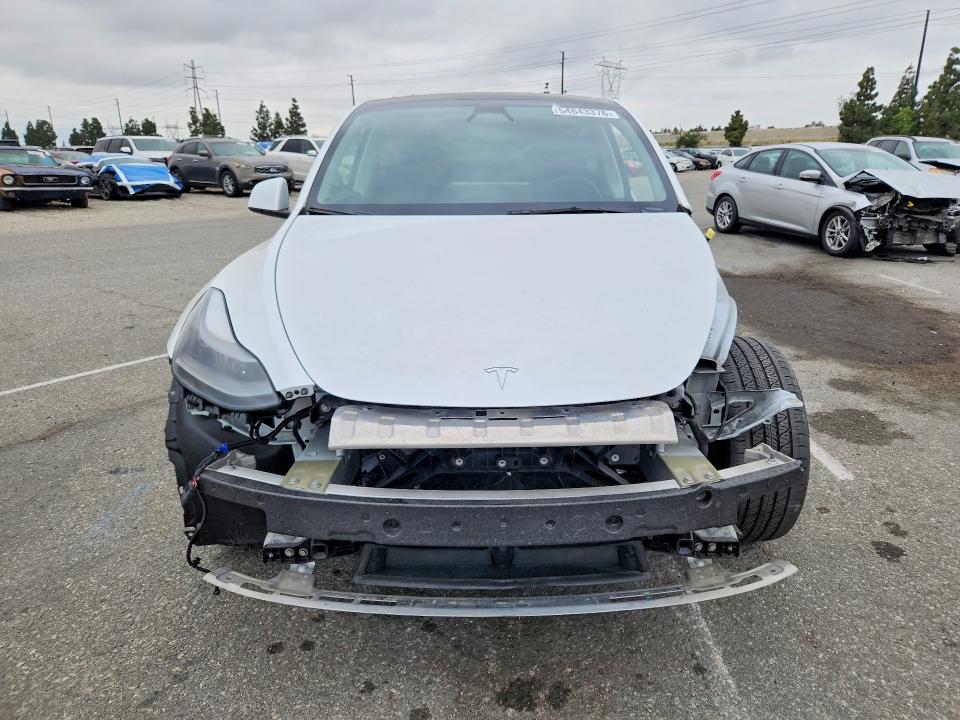 2024 Tesla Model y VIN 7SAYGDEE9RF075162 COPART salvage auction — SIDE, CA - SALVAGE CERTIFICATE, sold $150 on 2026-07-21 (photo 5)