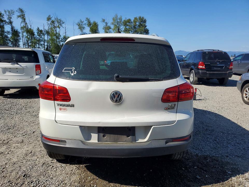 2017 Volkswagen Tiguan VIN WVGSV7AX5HK014776 COPART salvage auction — MINOR DENT/SCRATCHES, Ma - Certificate Of Title, sold $625 on 2026-07-20 (photo 6)
