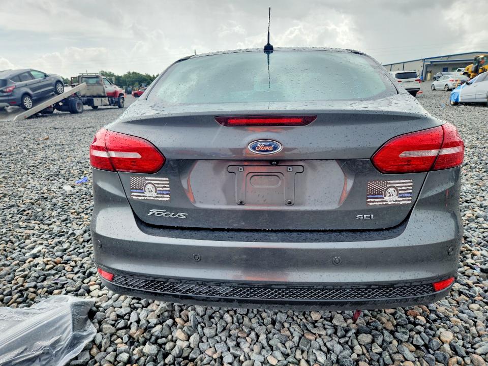 2018 Ford Focus VIN 1FADP3H25JL243488 COPART salvage auction — FRONT END, Fl - Cert Of Title Slvg Rebuildable, sold $575 on 2026-08-01 (photo 6)