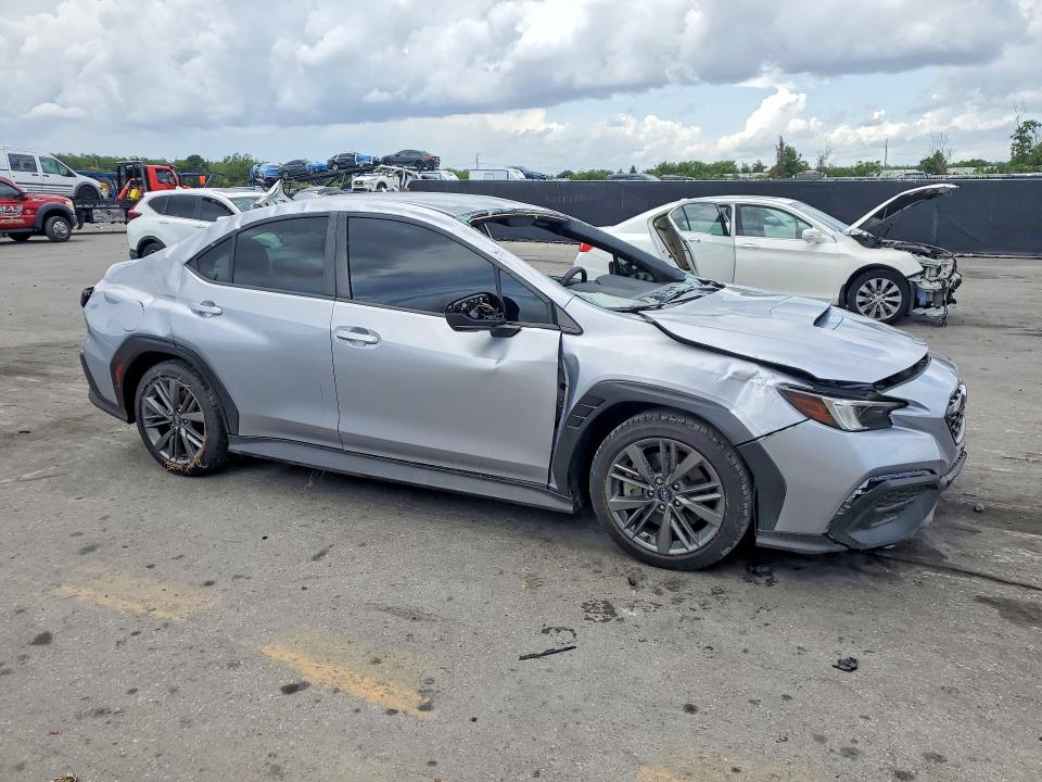 2023 Subaru Wrx VIN JF1VBAA66P9824430 COPART salvage auction — ROLLOVER, Fl - Certificate Of Destruction, sold $4,200 on 2026-07-02 (photo 4)
