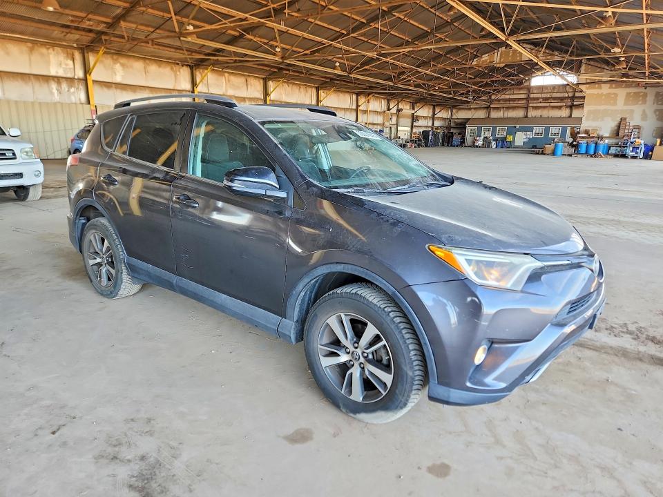 2017 Toyota Rav 4 VIN 2T3RFREV2HW560253 COPART salvage auction — MINOR DENT/SCRATCHES, ID - SALVAGE CERTIFICATE OF TITLE, sold $7,600 on 2026-07-29 (photo 4)