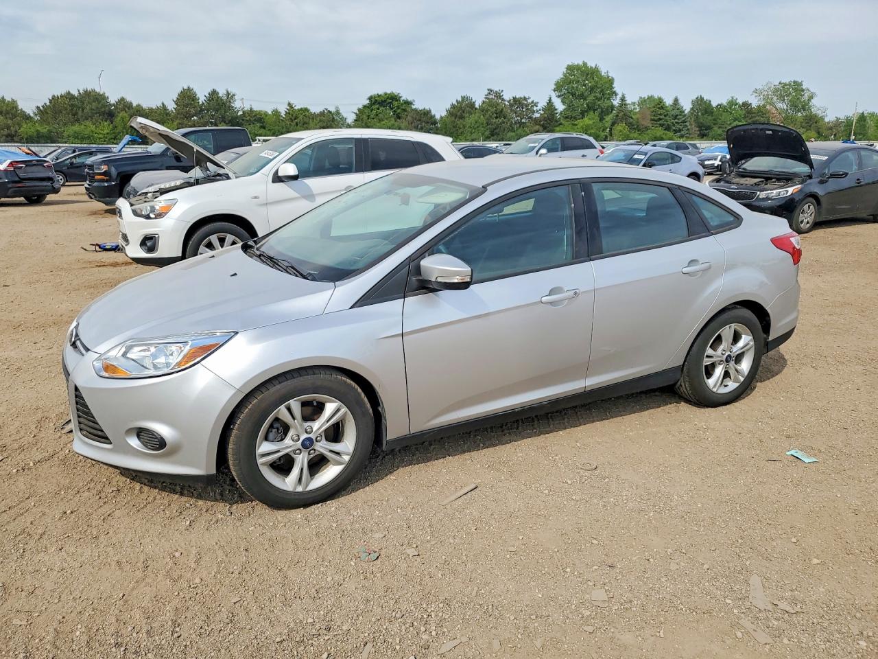 2014 Ford Focus VIN 1FADP3F25EL410991 COPART salvage auction — Side, IL - SALVAGE CERTIFICATE, sold $725 on 2026-06-30 (photo 1)