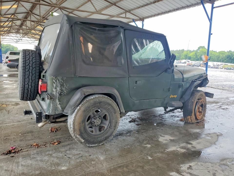 1995 Jeep Wrangler / VIN 1J4FY19P3SP313282 COPART salvage auction — ROLLOVER, GA - CERT OF TITLE-SALVAGE, sold $400 on 2026-07-02 (photo 3)
