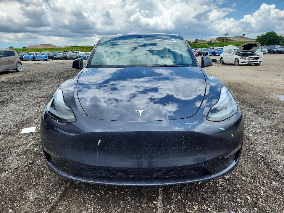 2024 Tesla Model y VIN 7SAYGDED7RA329696 COPART salvage auction — REAR END, Fl - Cert Of Title Slvg Rebuildable, sold $11,500 on 2026-07-23 (photo 5)