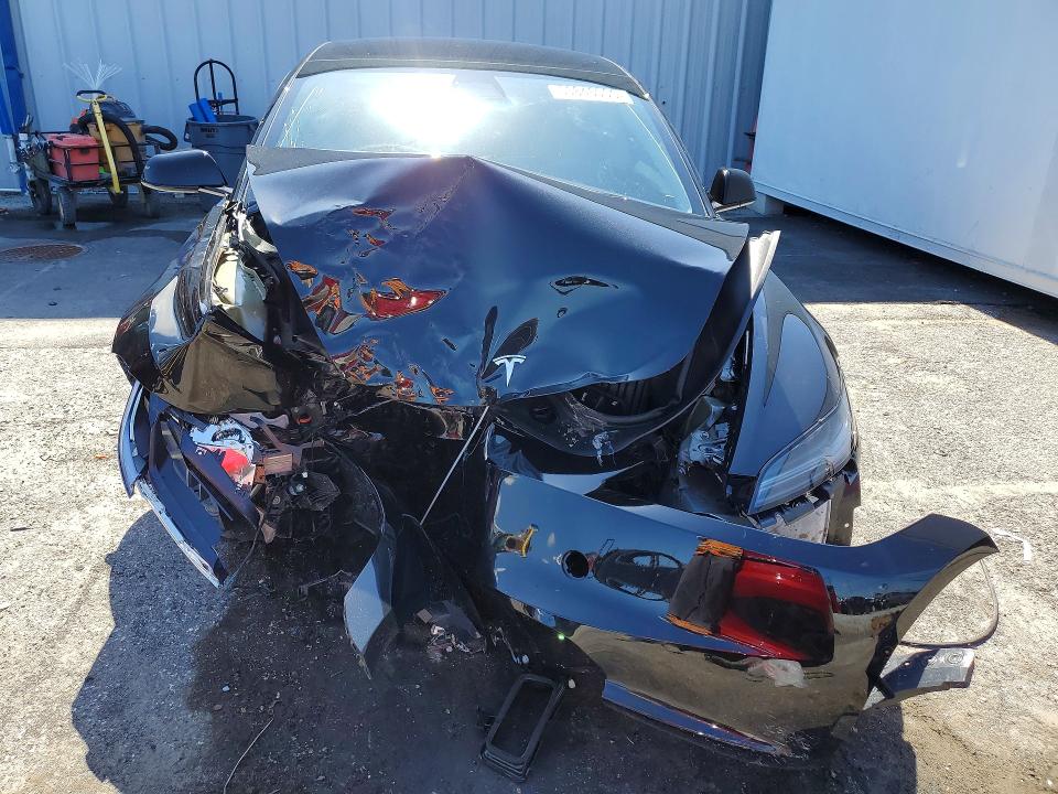 2025 Tesla VIN 5YJ3E1EA0SF069748 COPART salvage auction — FRONT END, Fl - Certificate Of Destruction, sold $5,700 on 2026-07-24 (photo 5)