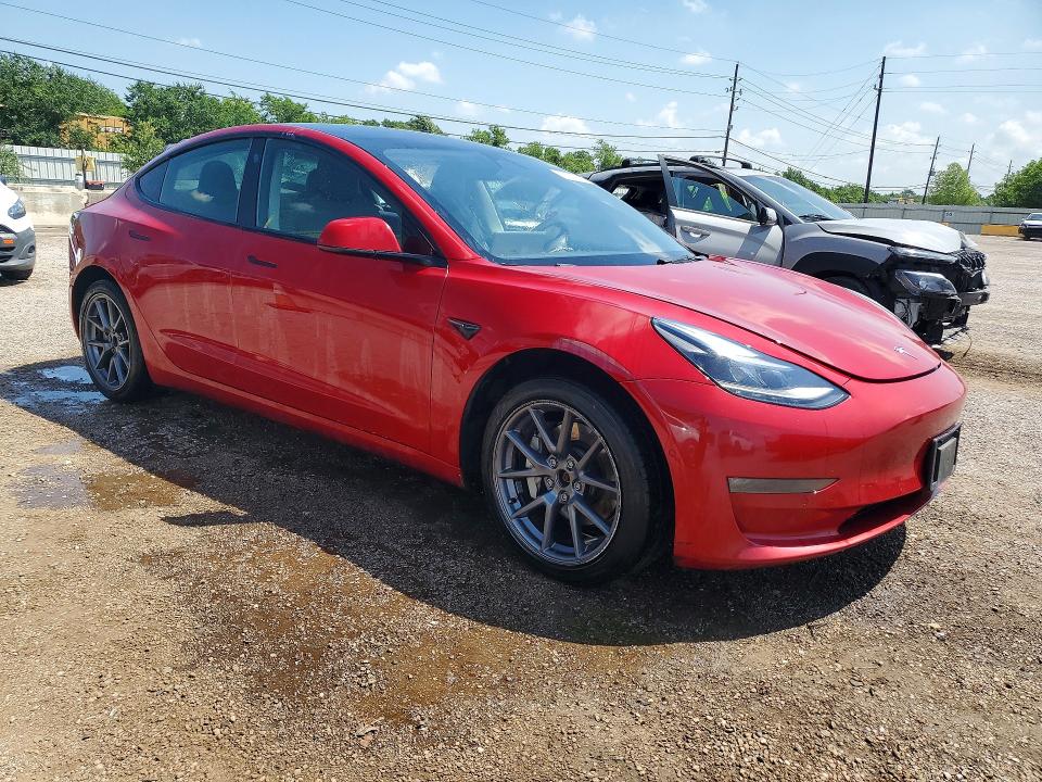 2022 Tesla Model 3 VIN 5YJ3E1EB1NF288053 COPART salvage auction — SIDE, Tx - Salvage Vehicle Title, sold $3,100 on 2026-07-09 (photo 4)
