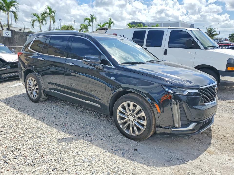 2021 Cadillac Xt6 VIN 1GYKPCRS0MZ206618 COPART salvage auction — SIDE, Fl - Cert Of Title Slvg Rebuildable, sold $8,600 on 2026-08-21 (photo 4)