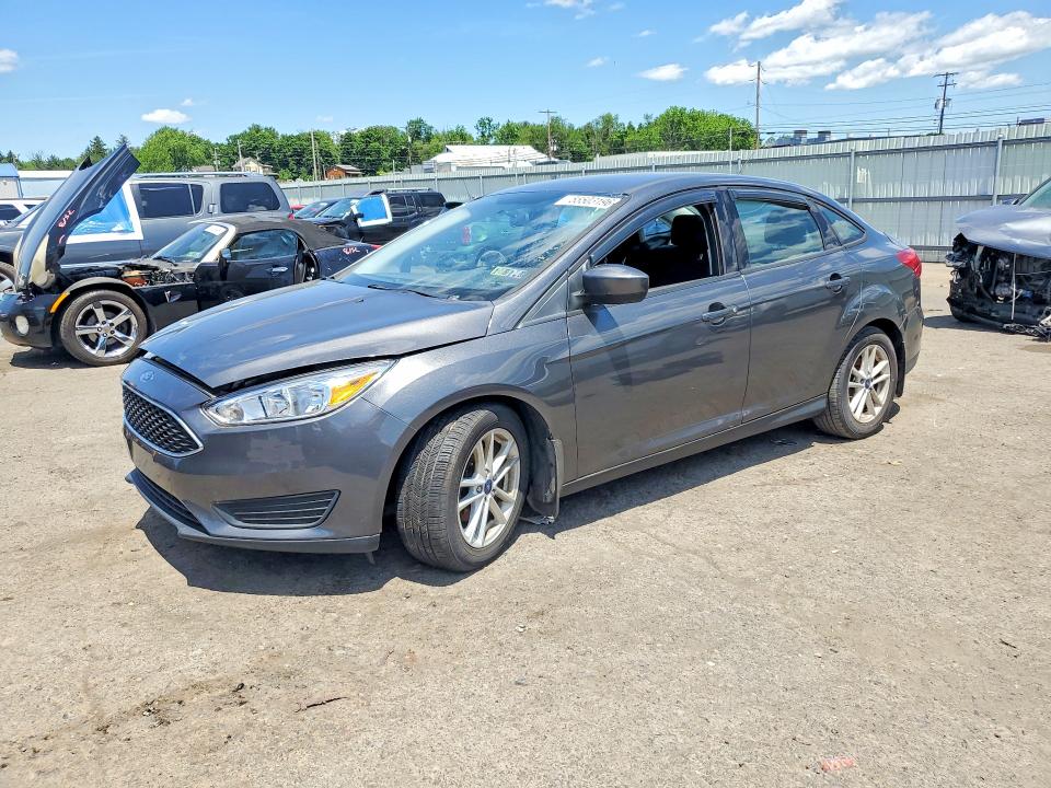 2018 Ford Focus VIN 1FADP3FE3JL226055 COPART salvage auction — MINOR DENT/SCRATCHES, Pa - Cert Of Title, sold $1,200 on 2026-07-23 (photo 1)
