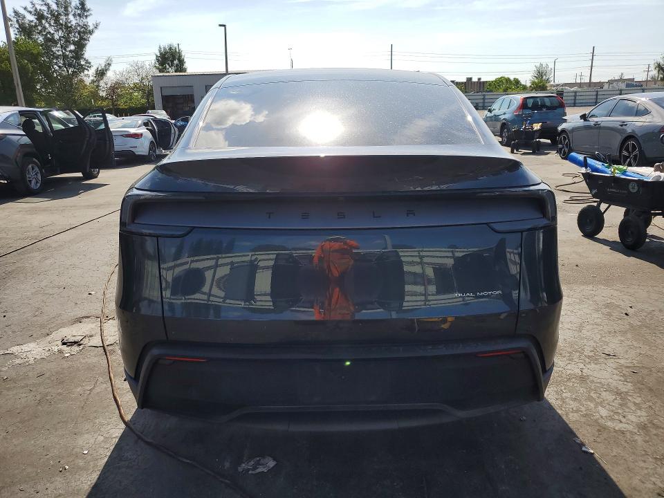2026 Tesla Model y VIN 7SAYGDEE1TA388288 COPART salvage auction — FRONT END, Fl - Cert Of Title Slvg Rebuildable, sold $19,400 on 2026-07-13 (photo 6)