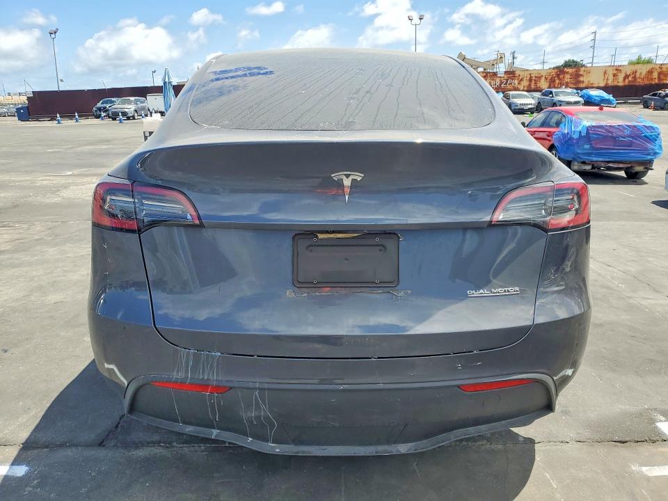 2023 Tesla Model y VIN 7SAYGDEE8PA113412 COPART salvage auction — MINOR DENT/SCRATCHES, Ca - Salvage Certificate, sold $14,100 on 2026-07-15 (photo 6)