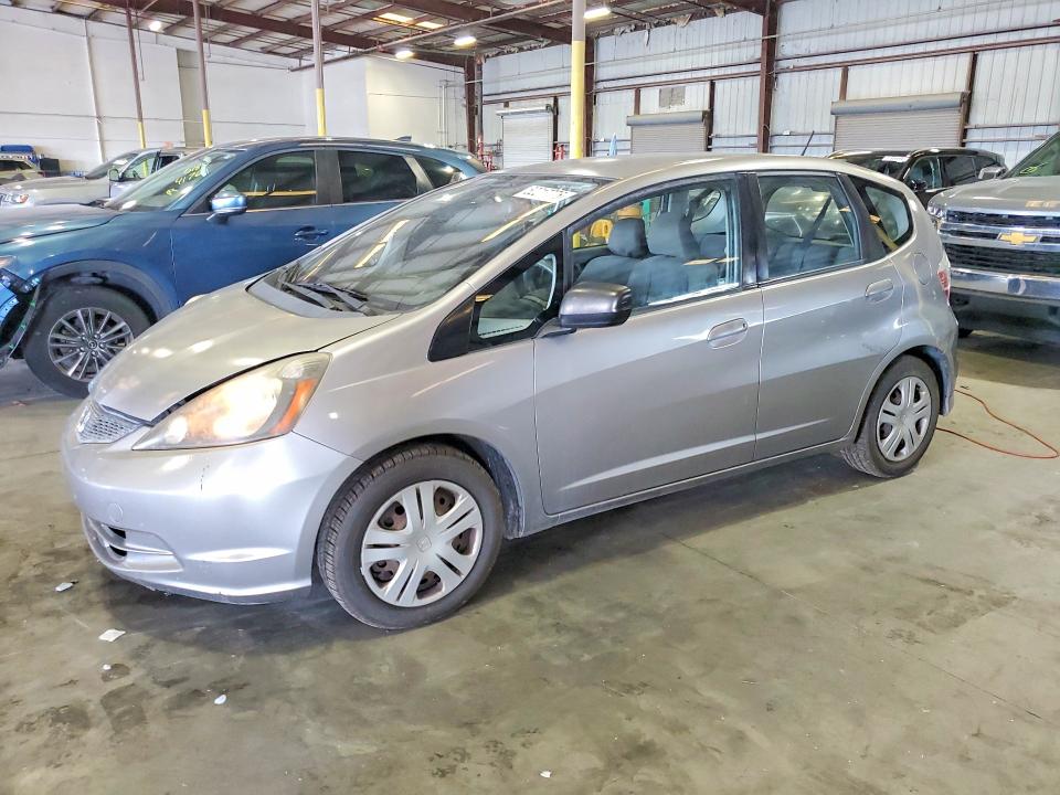 2010 Honda Fit VIN JHMGE8H27AS012865 COPART salvage auction — FRONT END, Fl - Cert Of Title Slvg Rebuildable, sold $775 on 2026-07-08 (photo 1)