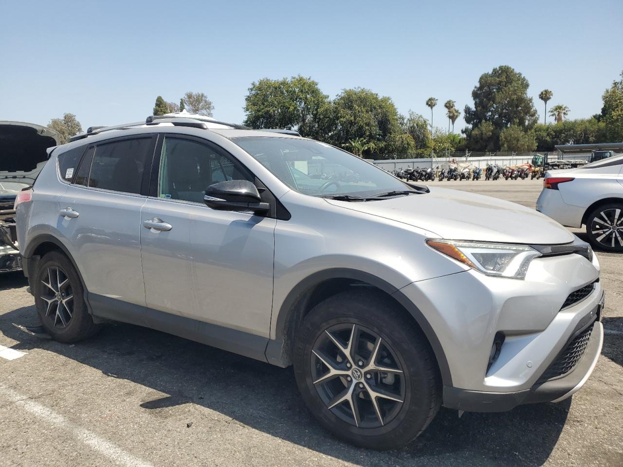 2016 Toyota RAV4 VIN 2T3NFREV7GW286366 COPART salvage auction — Rear End, Salvage Title, sold $9,525 on 2022-10-17 (photo 4)