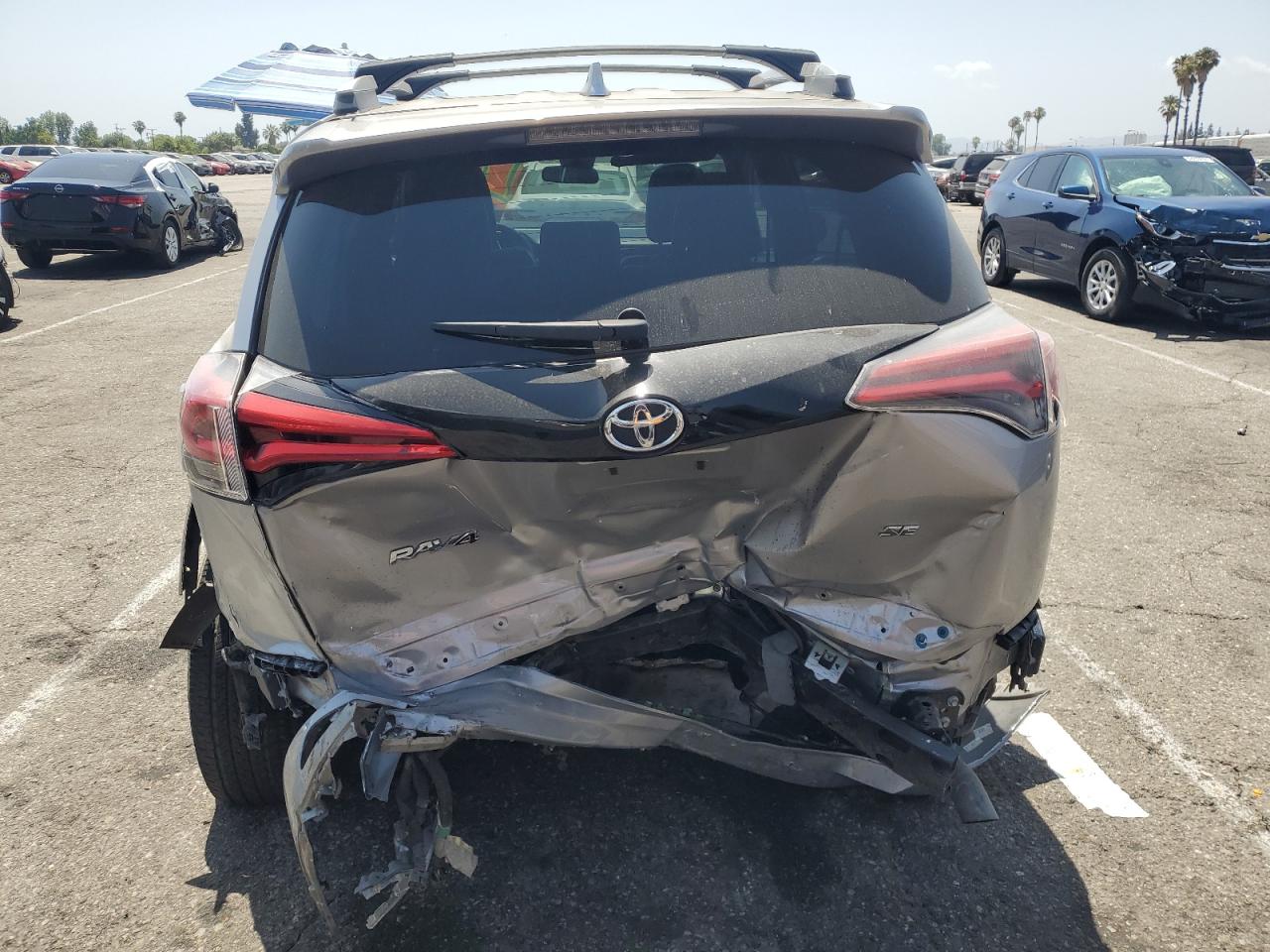2016 Toyota RAV4 VIN 2T3NFREV7GW286366 COPART salvage auction — Rear End, Salvage Title, sold $9,525 on 2022-10-17 (photo 6)