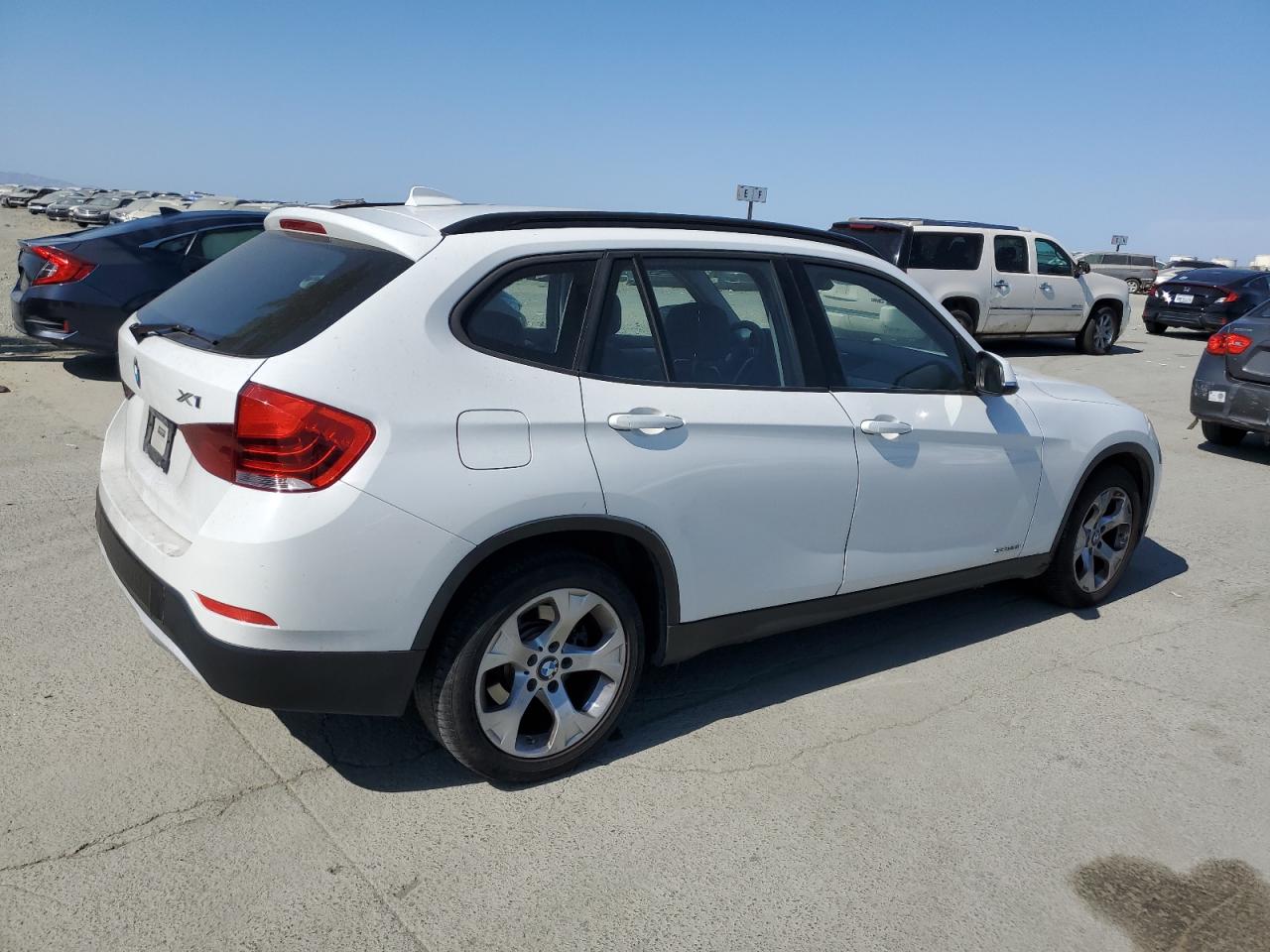 2014 BMW X1 VIN WBAVM1C51EVW49045 COPART salvage auction — MINOR DENT/SCRATCHES, Salvage Title, sold $0 on 2025-06-12 (photo 3)