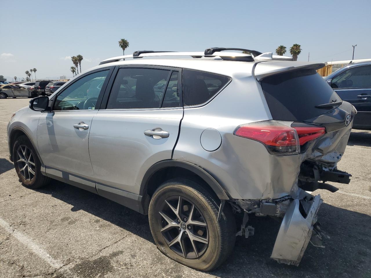 2016 Toyota RAV4 VIN 2T3NFREV7GW286366 COPART salvage auction — Rear End, Salvage Title, sold $9,525 on 2022-10-17 (photo 2)