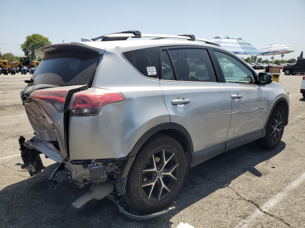 2016 Toyota RAV4 VIN 2T3NFREV7GW286366 COPART salvage auction — Rear End, Salvage Title, sold $9,525 on 2022-10-17 (photo 3)