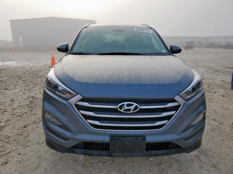 2018 Hyundai Tucson VIN KM8J3CA42JU728455 COPART salvage auction — VANDALISM, Tx - Certificate Of Title, sold $250 on 2026-07-16 (photo 5)