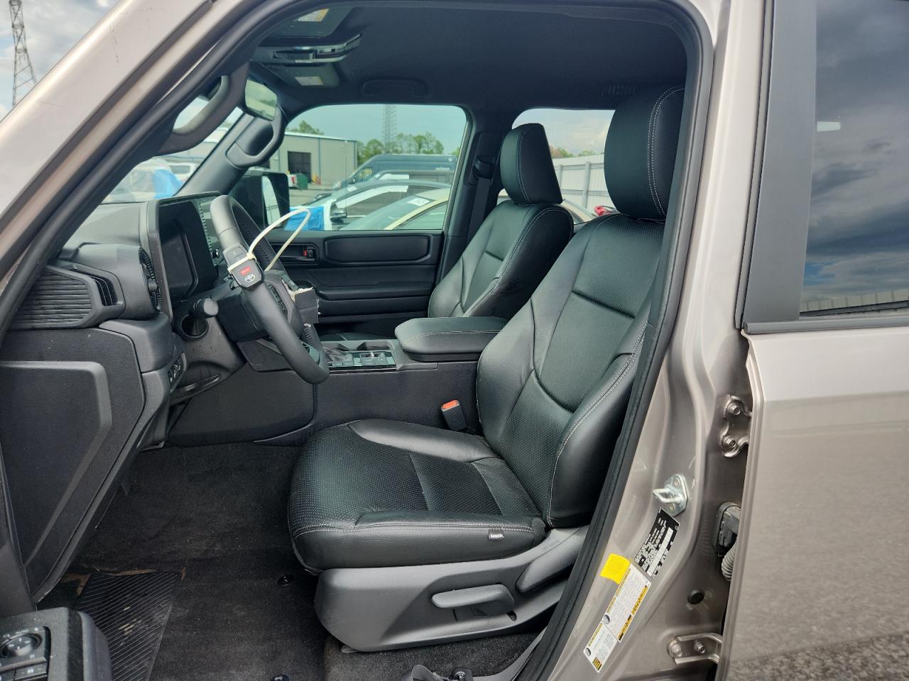 2025 Toyota Land Cruiser VIN JTEABFAJ1SK023105 COPART salvage auction — Front End, FL - CERT OF TITLE SLVG REBUILDABLE, sold $34,750 on 2026-06-30 (photo 7)