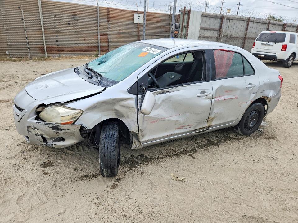 2012 Toyota Yaris VIN JTDBT4K37CL019985 COPART salvage auction — FRONT END, Ca - Salvage Certificate, sold $425 on 2026-07-30 (photo 1)
