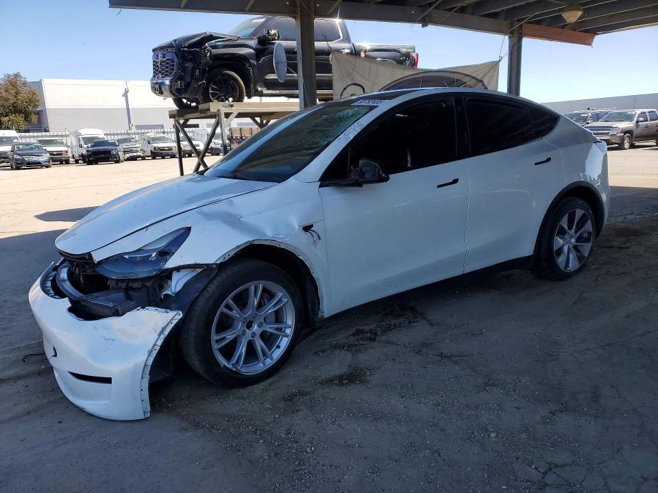 2023 Tesla Model y VIN 7SAYGDEE0PF744805 COPART salvage auction — FRONT END, CA - SALVAGE CERTIFICATE, sold $4,100 on 2026-07-28 (photo 1)