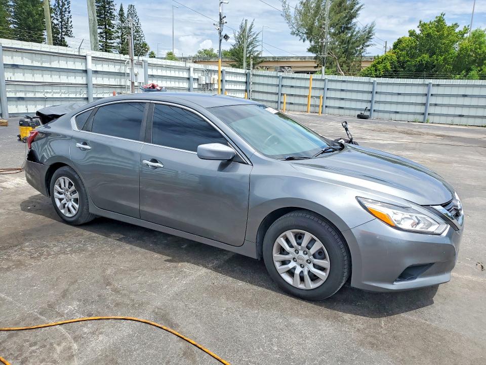 2016 Nissan Altima VIN 1N4AL3AP8GN356613 COPART salvage auction — REAR END, Fl - Cert Of Ttl-Rebuilt&Slvg Rbld, sold $700 on 2026-07-02 (photo 4)
