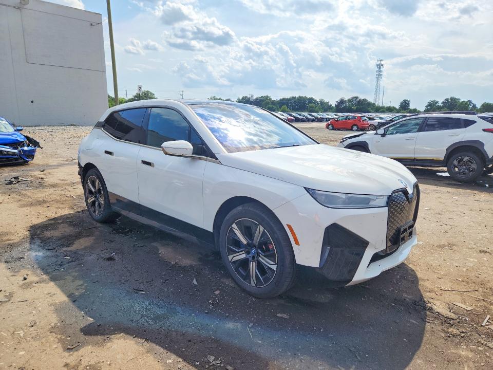 2024 BMW Ix VIN WB523CF0XRCN55473 COPART salvage auction — SIDE, Va - Cert Of Title - Salvage, sold $20,900 on 2026-07-15 (photo 4)