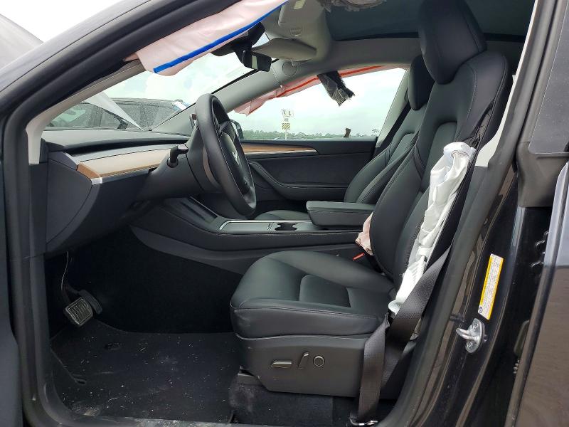 2025 Tesla Model y VIN 7SAYGDEE9SA353397 COPART salvage auction — FRONT END, TX - SALVAGE VEHICLE TITLE (P), sold $14,000 on 2026-07-17 (photo 7)