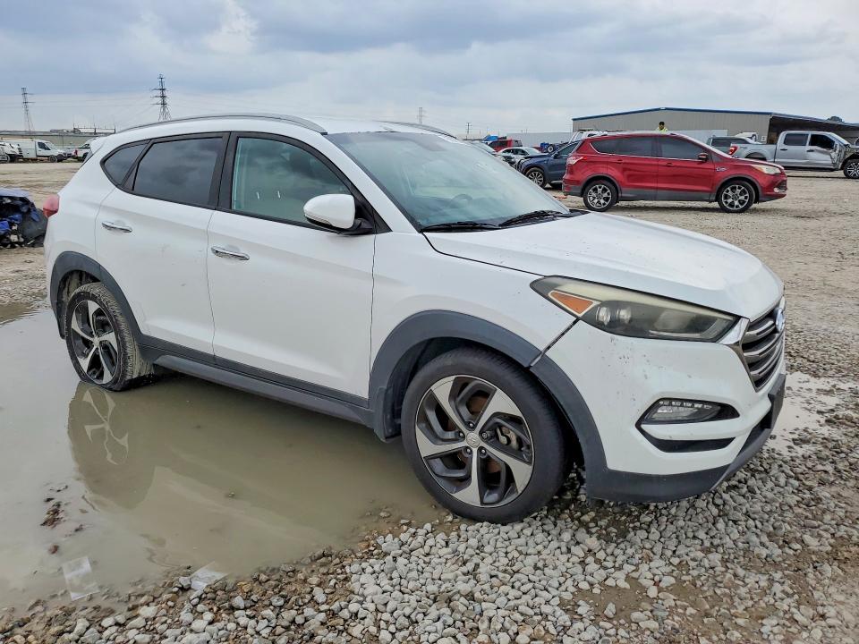 2016 Hyundai Tucson VIN KM8J33A23GU268603 COPART salvage auction — MINOR DENT/SCRATCHES, Tx - Certificate Of Title (P), sold $3,100 on 2026-07-10 (photo 4)