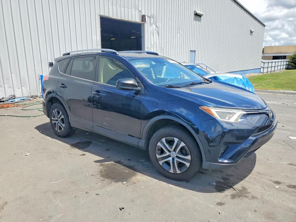 2018 Toyota Rav 4 VIN JTMZFREV9JJ174014 COPART salvage auction — MINOR DENT/SCRATCHES, Fl - Certificate Of Title, sold $6,300 on 2026-07-07 (photo 4)