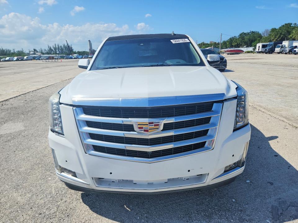 2015 Chevrolet Suburban VIN 1GNSCJKC0FR139800 COPART salvage auction — MINOR DENT/SCRATCHES, FL - CERTIFICATE OF TITLE, sold $9,000 on 2026-07-30 (photo 5)