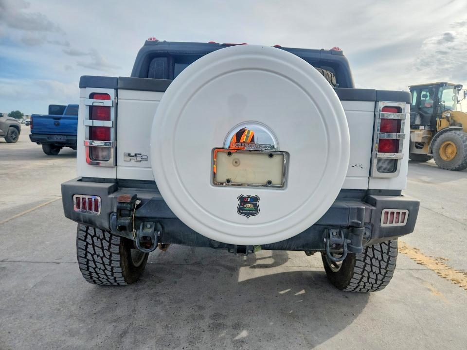 2006 Hummer H2 VIN 5GRGN22U06H106842 COPART salvage auction — WATER/FLOOD, LA - CERTIFICATE OF TITLE, sold $8,000 on 2026-07-08 (photo 6)