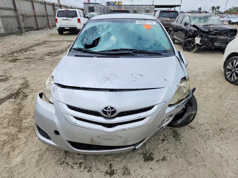 2012 Toyota Yaris VIN JTDBT4K37CL019985 COPART salvage auction — FRONT END, Ca - Salvage Certificate, sold $425 on 2026-07-30 (photo 5)