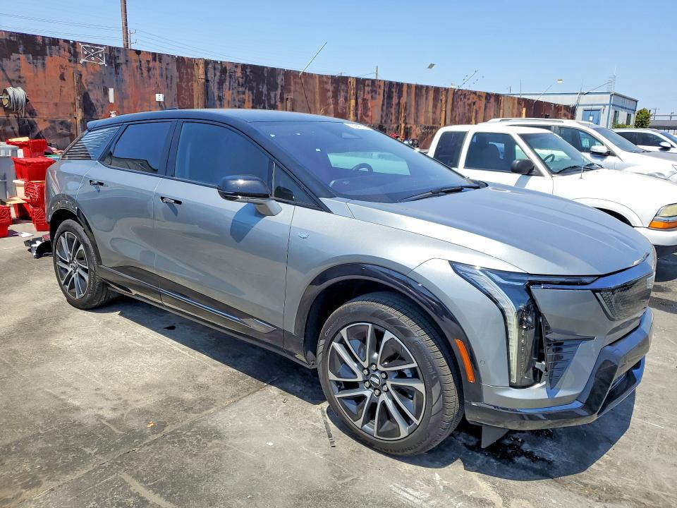 2026 Cadillac Optiq VIN 3GYK3GM50TS116899 COPART salvage auction — REAR END, Ca - Salvage Certificate, sold $9,000 on 2026-07-15 (photo 4)