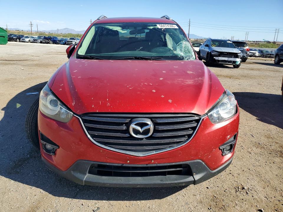 2016 Mazda VIN JM3KE4DY4G0821282 COPART salvage auction — SIDE, Az - Cert Of Title - Salvage, sold $1,650 on 2026-07-06 (photo 5)