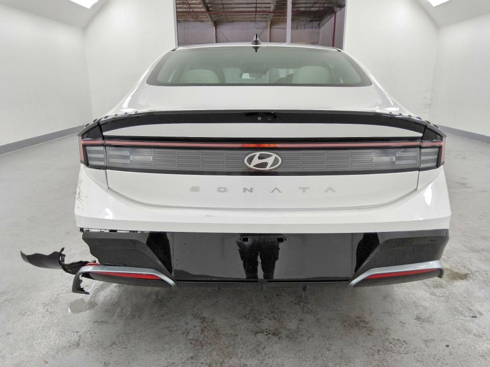 2025 Hyundai Sonata VIN KMHL64JA7SA466429 COPART salvage auction — REAR END, AZ - CERT OF TITLE - SALVAGE, sold $8,300 on 2026-07-15 (photo 6)