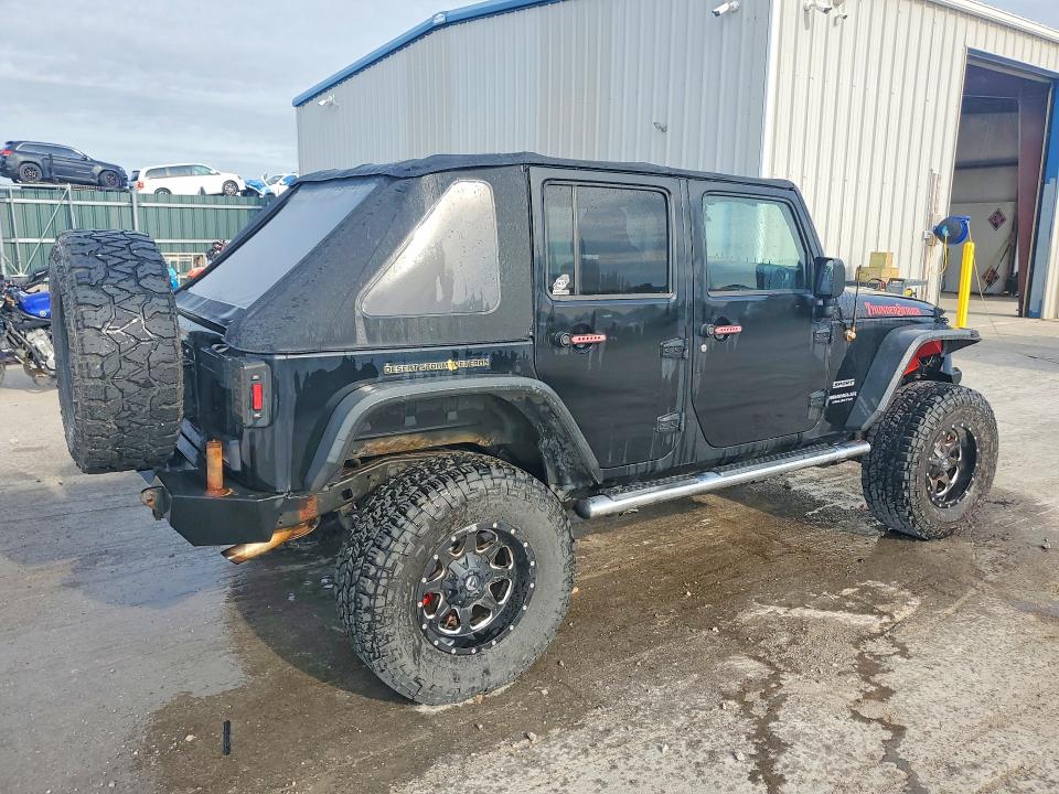 2014 Jeep Wrangler unlimited VIN 1C4BJWDG8EL120036 COPART salvage auction — ALL OVER, Mo - Salvage Certificate Of Title, sold $50 on 2026-08-10 (photo 3)