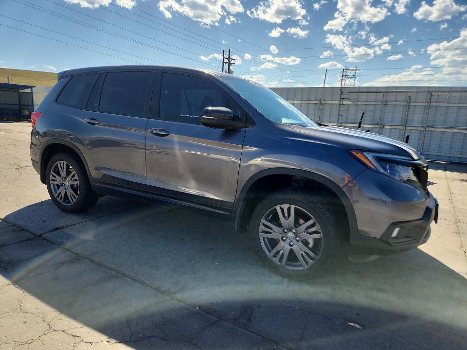 2021 Honda Passport VIN 5FNYF8H53MB040287 COPART salvage auction — SIDE, Co - Public - Salvage Title, sold $9,300 on 2026-07-20 (photo 4)