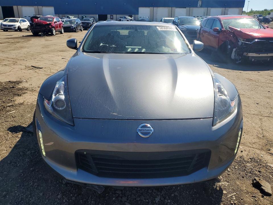 2018 Nissan VIN JN1AZ4EH7JM570347 COPART salvage auction — SIDE, Mi - Certificate Of Title, sold $8,000 on 2026-07-14 (photo 5)