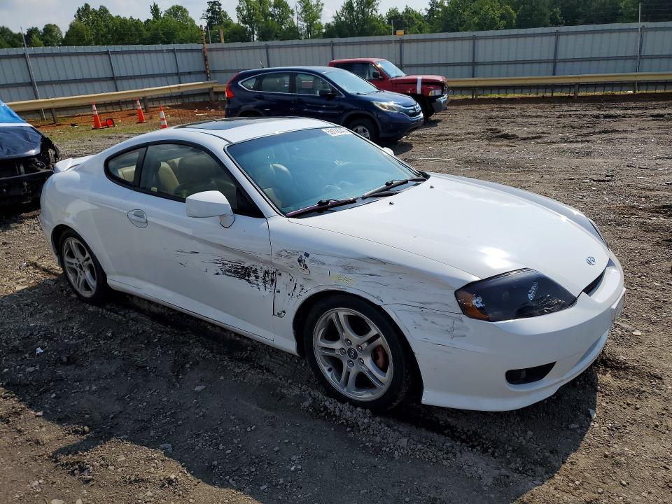 2006 Hyundai Tiburon VIN KMHHN65F06U225519 COPART salvage auction — FRONT END, VA - CERT OF TITLE - SALVAGE, sold $250 on 2026-07-10 (photo 4)