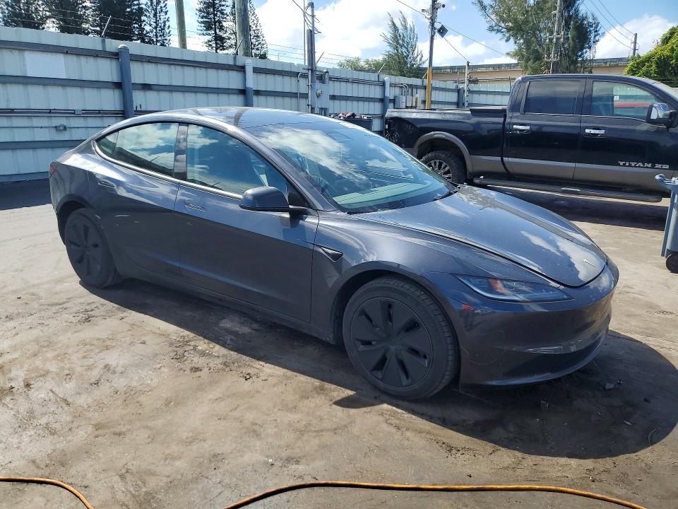2024 Tesla Model 3 VIN 5YJ3E1EA5RF870296 COPART salvage auction — SIDE, FL - CERT OF TITLE SLVG REBUILDABLE, sold $6,900 on 2026-07-22 (photo 4)