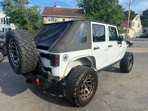 2014 Jeep Wrangler / VIN 1C4BJWDG7EL203909 COPART salvage auction — MINOR DENT/SCRATCHES, In - Certificate Of Title (P), sold $10,700 on 2026-07-29 (photo 3)