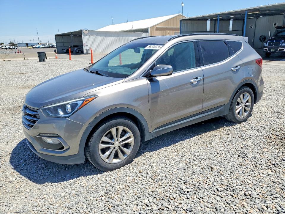2017 Hyundai Santa fe VIN 5XYZUDLA8HG489910 COPART salvage auction — NORMAL WEAR, MI - DIS/DLR/EXP ONLY CLEAN TITLE, sold $2,650 on 2026-07-09 (photo 1)