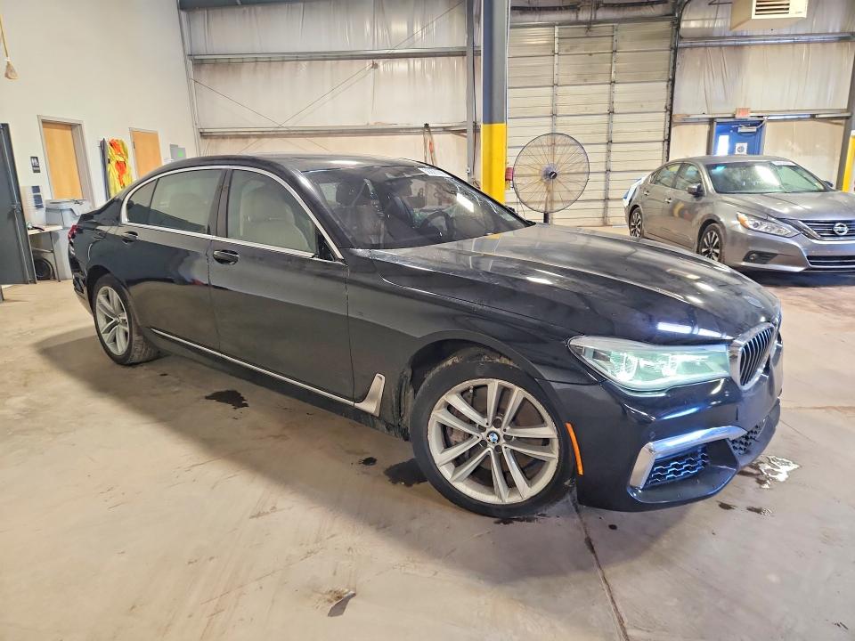 2016 BMW 7er VIN WBA7F2C51GG418551 COPART salvage auction — VANDALISM, Pa - Cert Of Salv-R=Reconstructed, sold $5,200 on 2026-07-06 (photo 4)