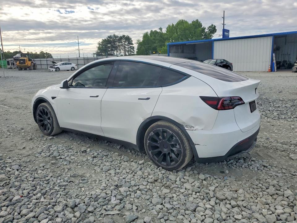 2021 Tesla Model y VIN 5YJYGAEE1MF195414 COPART salvage auction — SIDE, Nc - Salvage Certificate Of Title, sold $5,100 on 2026-07-22 (photo 2)